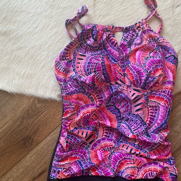 Krista brand one-piece swimsuit with a colorful, patterned top and black bottom - Picture 4 of 8